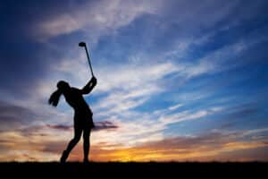 lori myers posing in golf hitting style